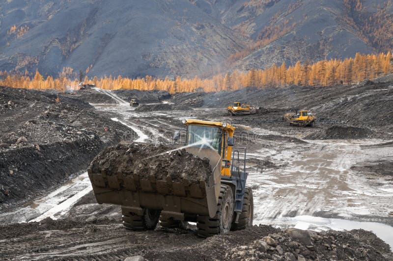 Open pit mining of natural gold in the mountains of Eastern Siberia.
In the process of work, such equipment is used as: Bulldozers, wheel loaders, mining dump trucks, Excavators, Stationary industrial equipment for washing natural gold. Open pit mining of natural gold in the mountains of Eastern Siberia.
In the process of work, such equipment is used as: Bulldozers, wheel loaders, mining dump trucks, Excavators, Stationary industrial equipment for washing natural gold