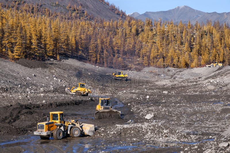 Open pit mining of natural gold in the mountains of Eastern Siberia.
In the process of work, such equipment is used as: Bulldozers, wheel loaders, mining dump trucks, Excavators, Stationary industrial equipment for washing natural gold. Open pit mining of natural gold in the mountains of Eastern Siberia.
In the process of work, such equipment is used as: Bulldozers, wheel loaders, mining dump trucks, Excavators, Stationary industrial equipment for washing natural gold