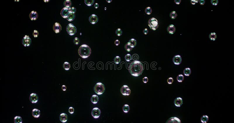 Bulles de soupe isolées sur fond noir photos libres de droits Bulles de soupe isolées sur fond noir photos libres de droits