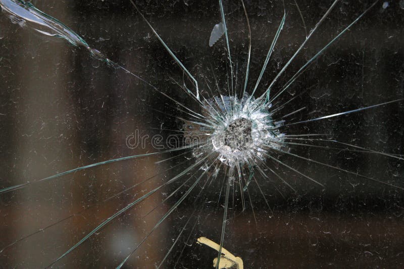 Bullet Hole in Glass