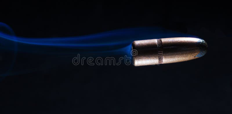 Bullet with smoke royalty free stock photography