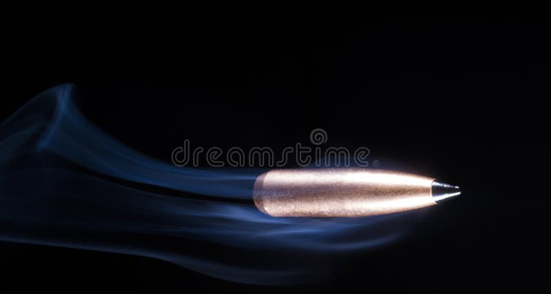 Bullet with smoke flying stock image