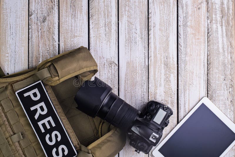 Bulletproof vest for press,camera and tablet pc stock photo Bulletproof vest for press,camera and tablet pc stock photo