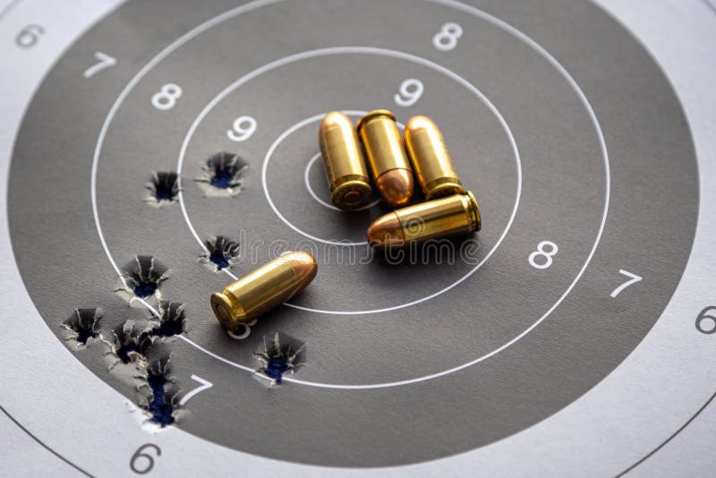 Bullets on paper target for shooting practice royalty free stock photography Bullets on paper target for shooting practice royalty free stock photography