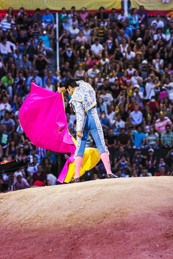 Bullfighter Making Movements in Front of the Spectators in the a
