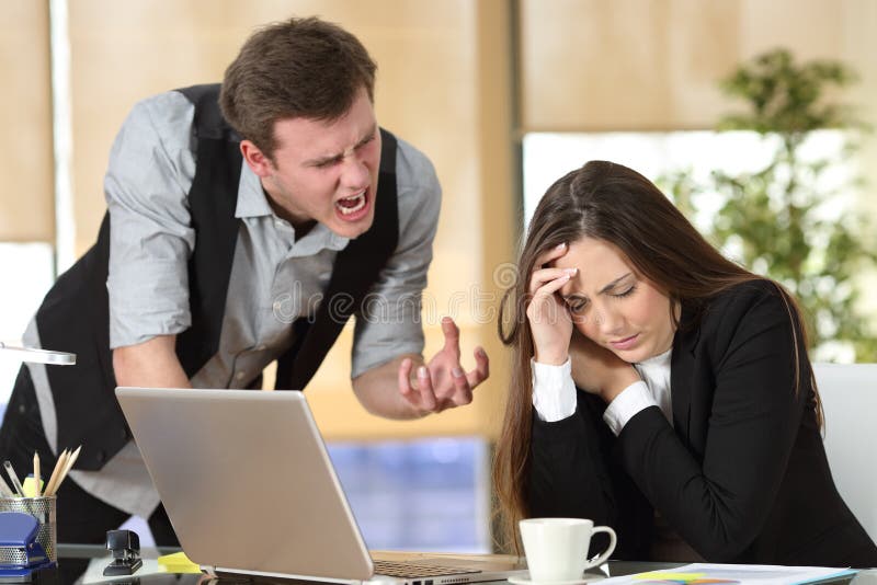 Bullying with a boss shouting to an employee stock photos Bullying with a boss shouting to an employee stock photos