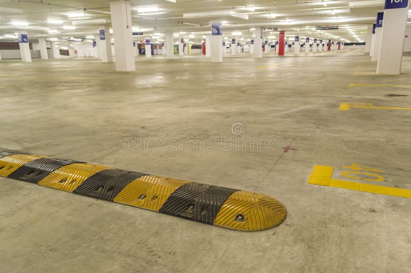 Bumper at Empthy Parking Lot Stock Photo Image of inside, garage