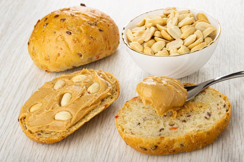Bun, Peanut in Bowl, Sandwich with Peanut Butter, Spoon with Paste on