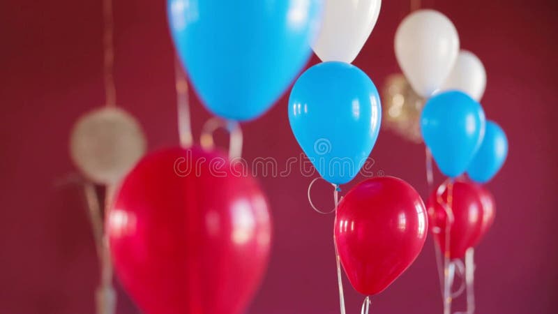 Bunch Of Colourful Balloons On Dark Red Background