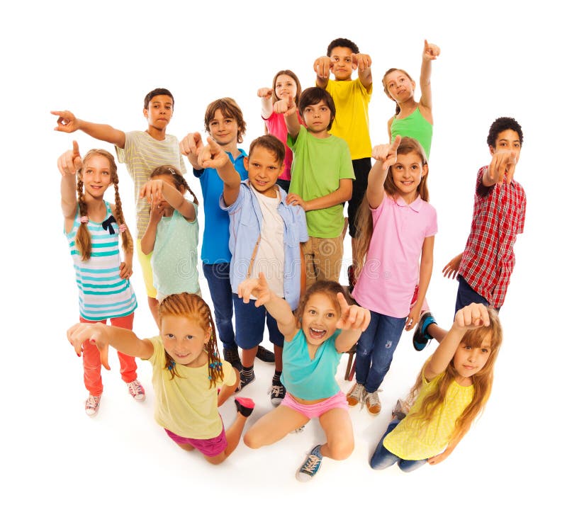 Bunch of diverse kids standing pointing at camera stock photo Bunch of diverse kids standing pointing at camera stock photo