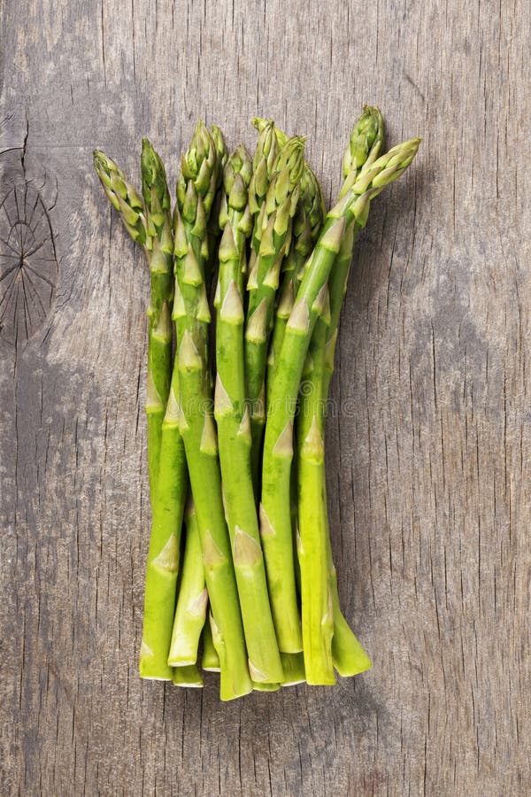 Bunch of Fresh Green Asparagus on Old Wood Board Stock Image Image of