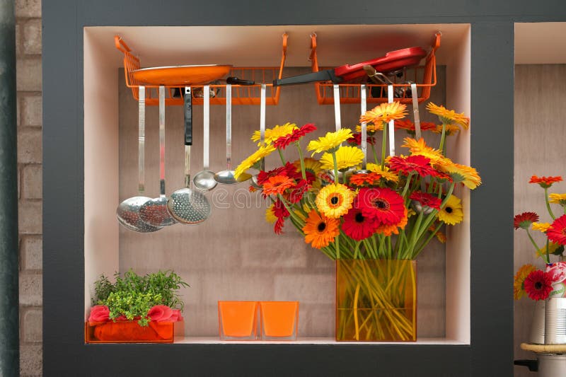 Bunch of orange flowers in kitchen interior