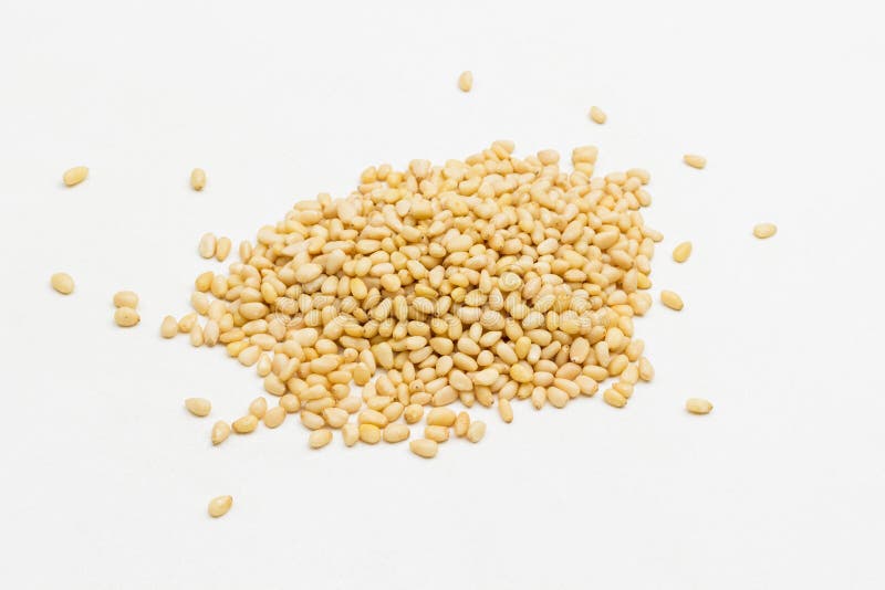 Bunch of peeled pine nuts royalty free stock photos