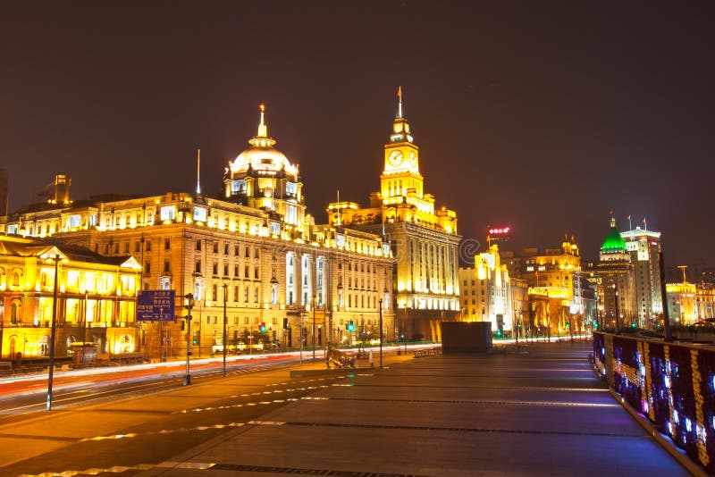 The night scenes of Shanghai bund(The finance street The Oriental Wall street) - landmark of Shanghai, China. Shanghai, abbreviated as Shanghai. It is a municipality directly under the Central Government of the People's Republic of China, the birthplace of the CPC, a national central city, a megacity, a core city in the Shanghai metropolitan area, a famous historical and cultural city in China, and a world-class city. Shanghai has basically established itself as an international economic, financial, trade, and shipping center, forming a basic framework for a technology innovation center with global influence.