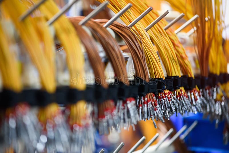 Bundle of crimped cables with electrical connectors. Terminated wire ready for connection. Industrial theme stock photo