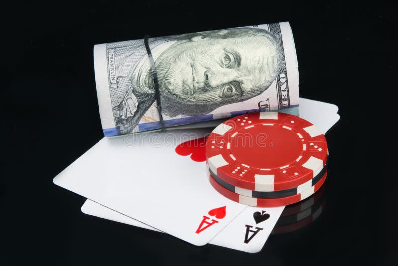 A Bundle of Hundred Dollar Bills, Lying on the Chips and Cards for