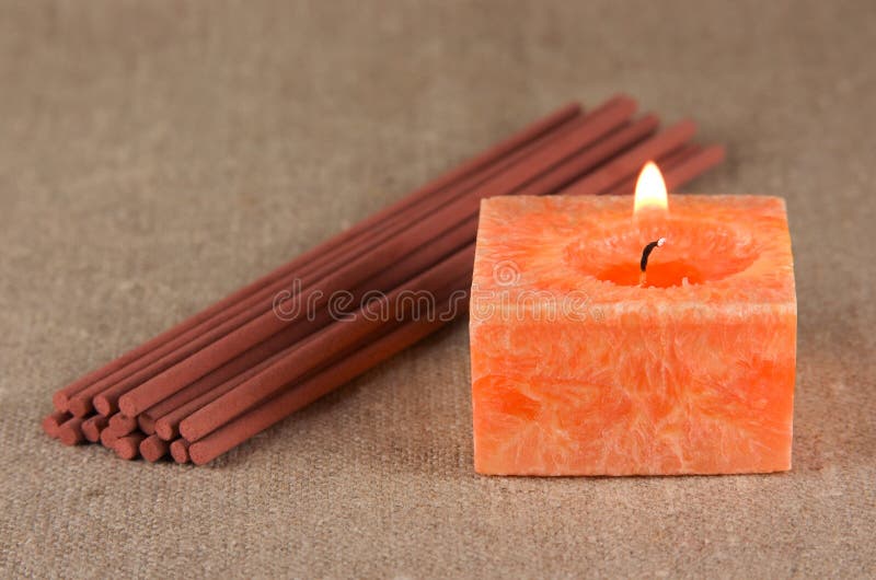 A Bundle of Incense Sticks and a Candle Stock Photo Image of brown, candle 15218652