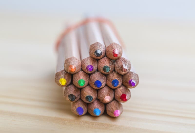 Bundle of Pencils on a Wooden Table royalty free stock photo