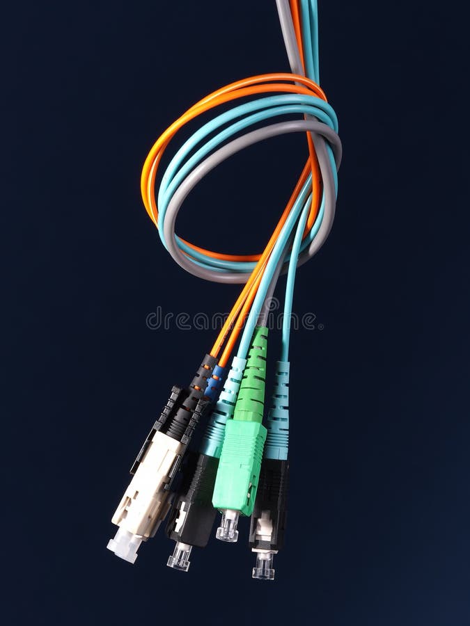Bundle of Three Fiber Optic Patch Cords with Connectors Arranged in a