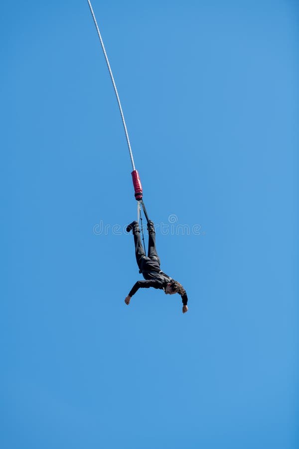 Bungee jumping in the sky editorial image. Image of elastic 221133405