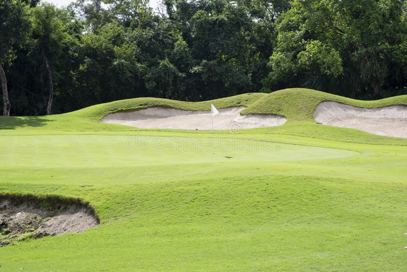 A Golf course with sand bunkers in Mexico. A Golf course with sand bunkers in Mexico