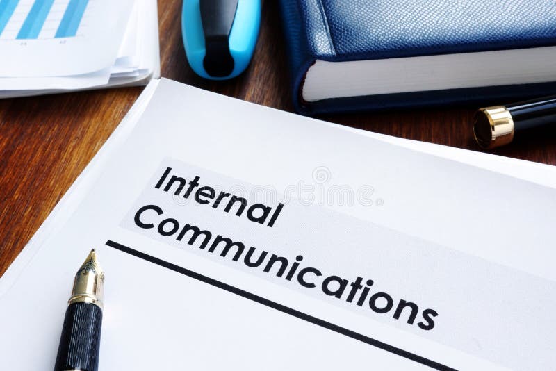 Stack of internal communications documents on a table. Stack of internal communications documents on a table