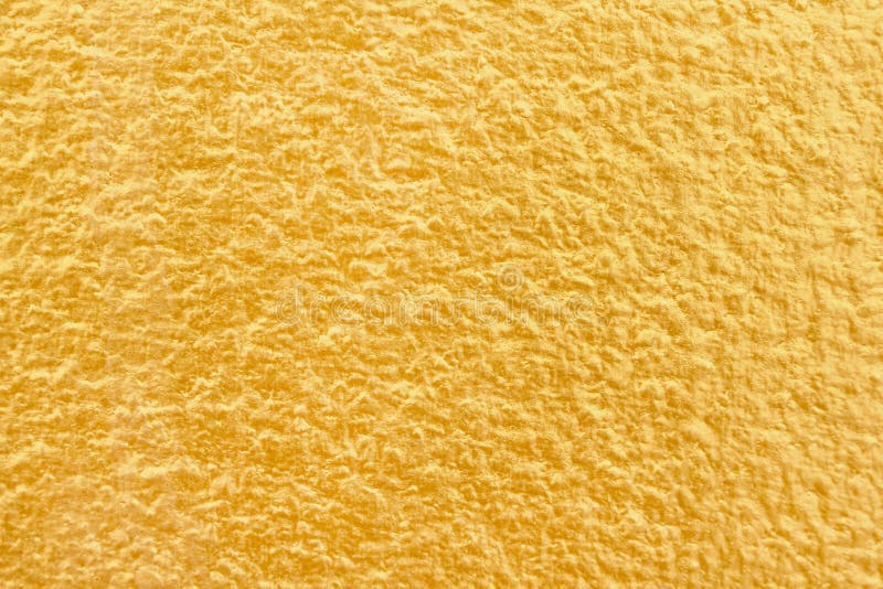 Bunte Goldfarbe auf Betonmauer mit rauer nahtloser Musterbeschaffenheitszusammenfassung für Hintergrund stockbilder Bunte Goldfarbe auf Betonmauer mit rauer nahtloser Musterbeschaffenheitszusammenfassung für Hintergrund stockbilder