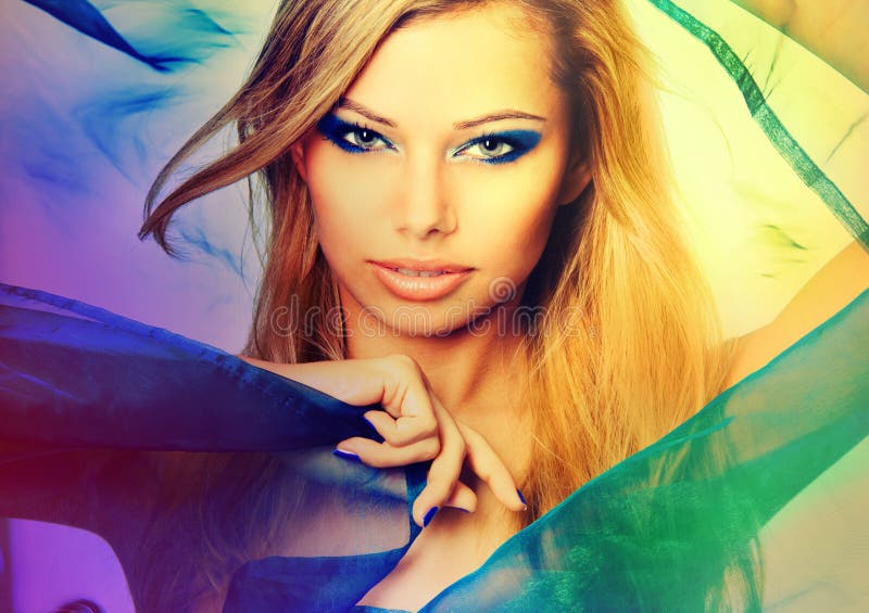 Colorful portrait of a young blond woman with bright make up. Colorful portrait of a young blond woman with bright make up