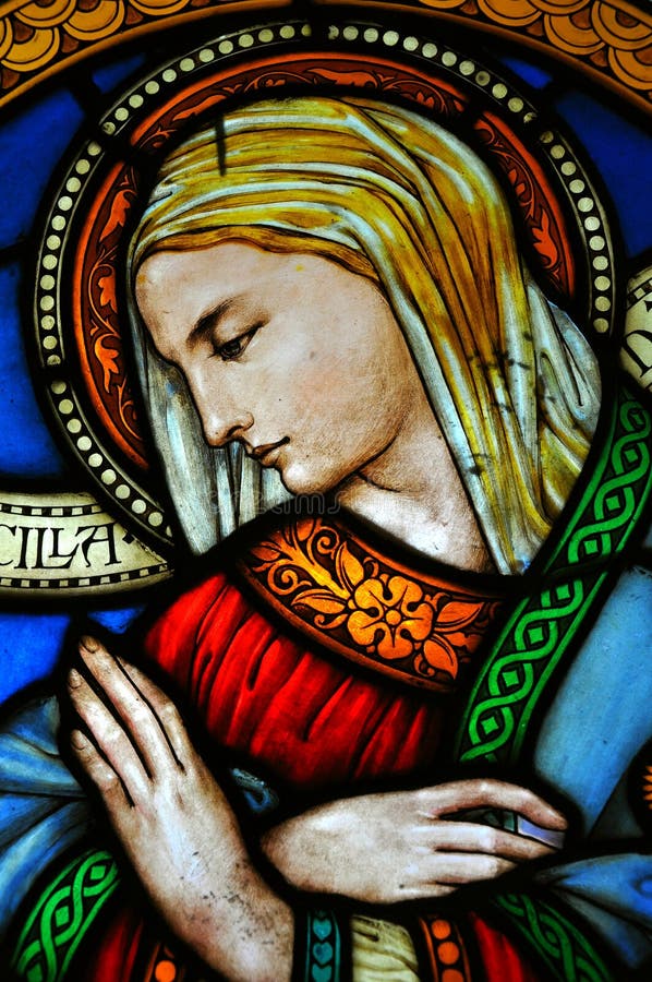 Artistic stained glass on a chatolic church window in Fiesole, Italy. Madonna painting. Artistic stained glass on a chatolic church window in Fiesole, Italy. Madonna painting