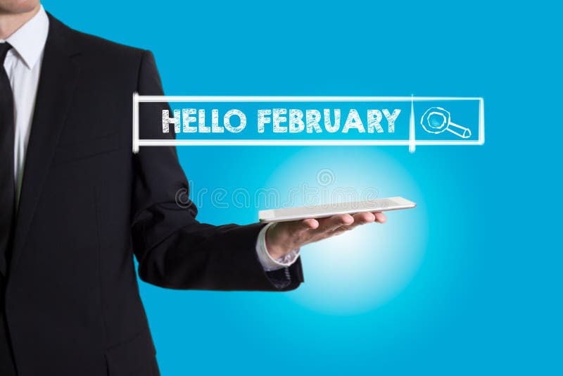 Bună ziua, tinere din februarie, care ține un calculator pentru tablete stock images