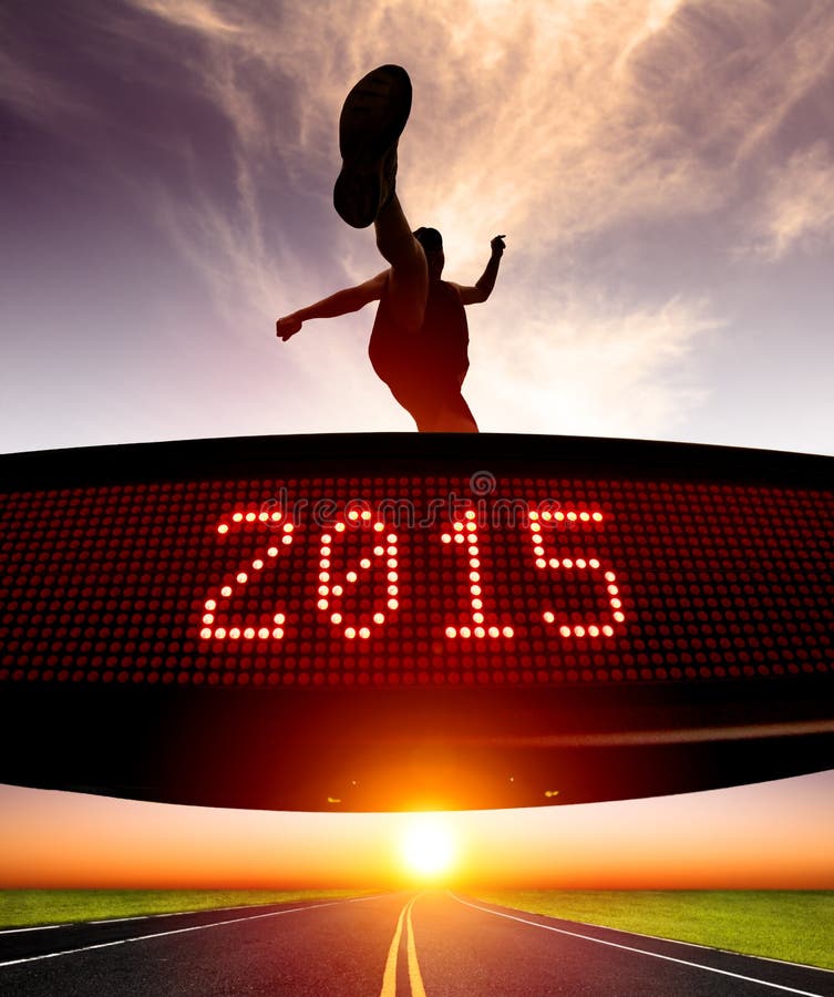Buon anno 2015 il corridore che salta e che attraversa la matrice fotografie stock libere da diritti Buon anno 2015 il corridore che salta e che attraversa la matrice fotografie stock libere da diritti