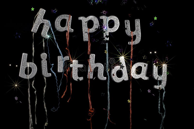 Happy birthday in silver glitter party text with streamers stars and fireworks effect. Ideal birthday card, party invitation or poster image. Happy birthday in silver glitter party text with streamers stars and fireworks effect. Ideal birthday card, party invitation or poster image.