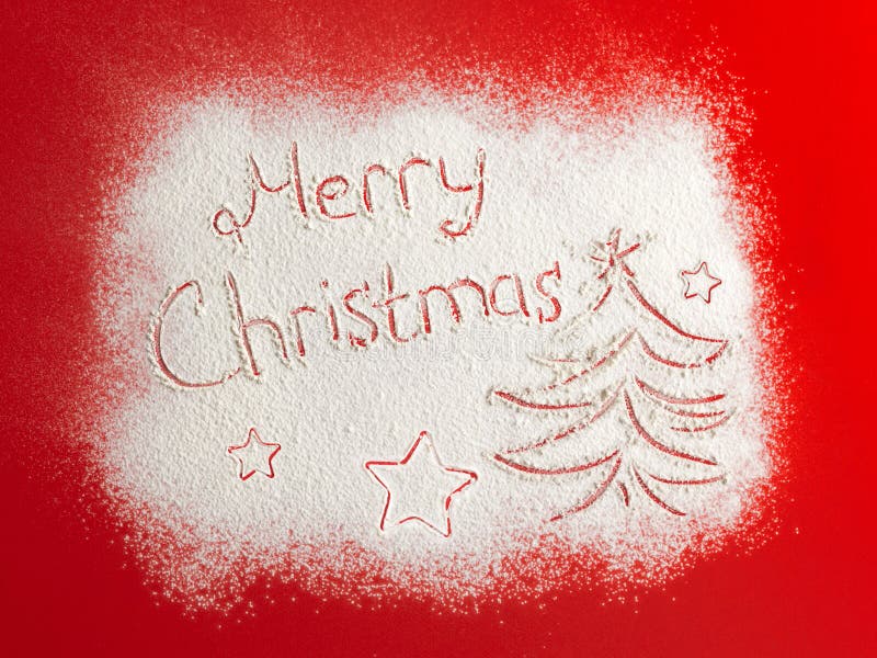 Buon Natale di parole scritte su un campo di neve, concetto del nuovo anno immagini stock libere da diritti Buon Natale di parole scritte su un campo di neve, concetto del nuovo anno immagini stock libere da diritti