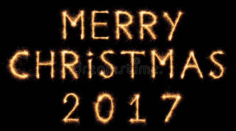 BUON NATALE 2017 iscrizioni disegnate con le scintille del bengalese immagini stock libere da diritti BUON NATALE 2017 iscrizioni disegnate con le scintille del bengalese immagini stock libere da diritti