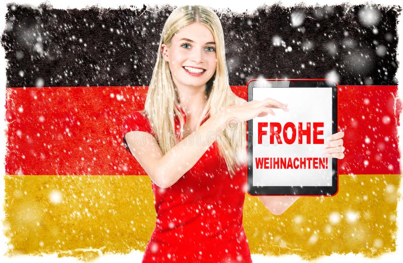Buon Natale tedesco Frohe Weihnachten della bandiera nazionale della donna fotografia stock Buon Natale tedesco Frohe Weihnachten della bandiera nazionale della donna fotografia stock