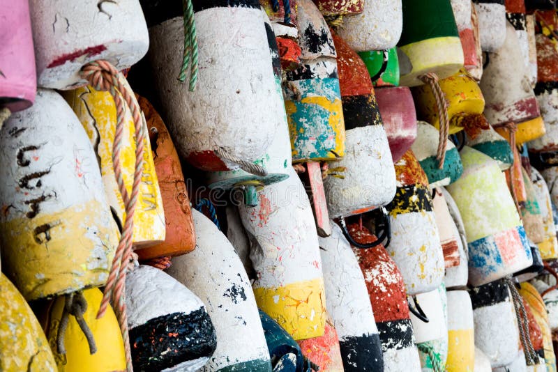 Buoys hanging in a wall at the pier