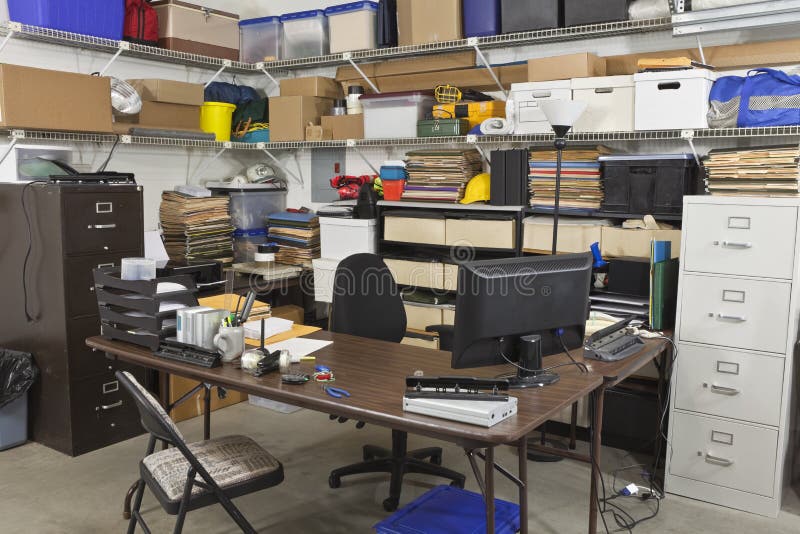 Messy back office with piles of files and shipping boxes. Messy back office with piles of files and shipping boxes.