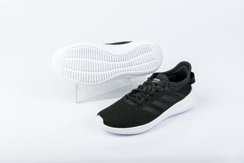 BULGARIA - MARCH 2019: Adidas Women`s Essentials Cloudfoam QT Shoes Black on Background Editorial Image - Image of jogging, modern: 141989670