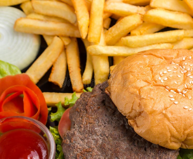 Burger and Chips Shows Ready To Eat and Cholesterol Stock Image Image