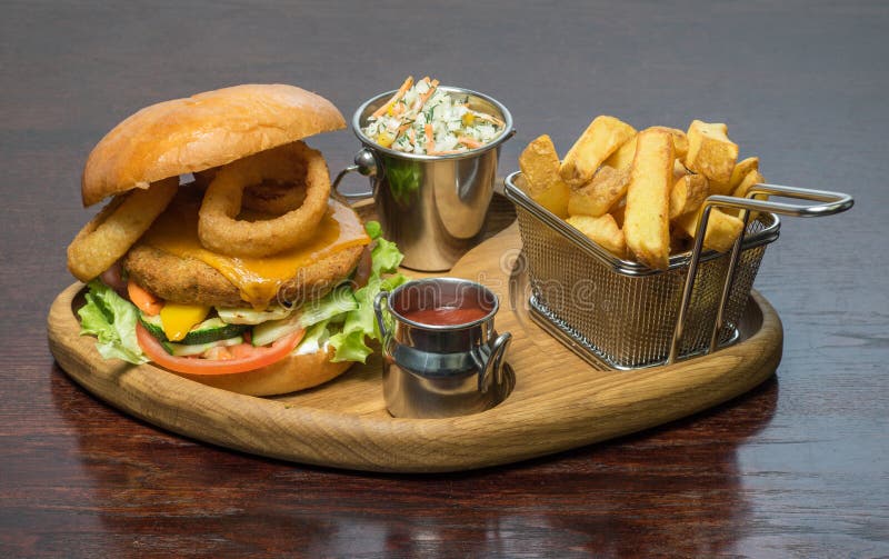 Beer and Snacks. Burger and Fries. Hamburger and Chips. Stock Photo