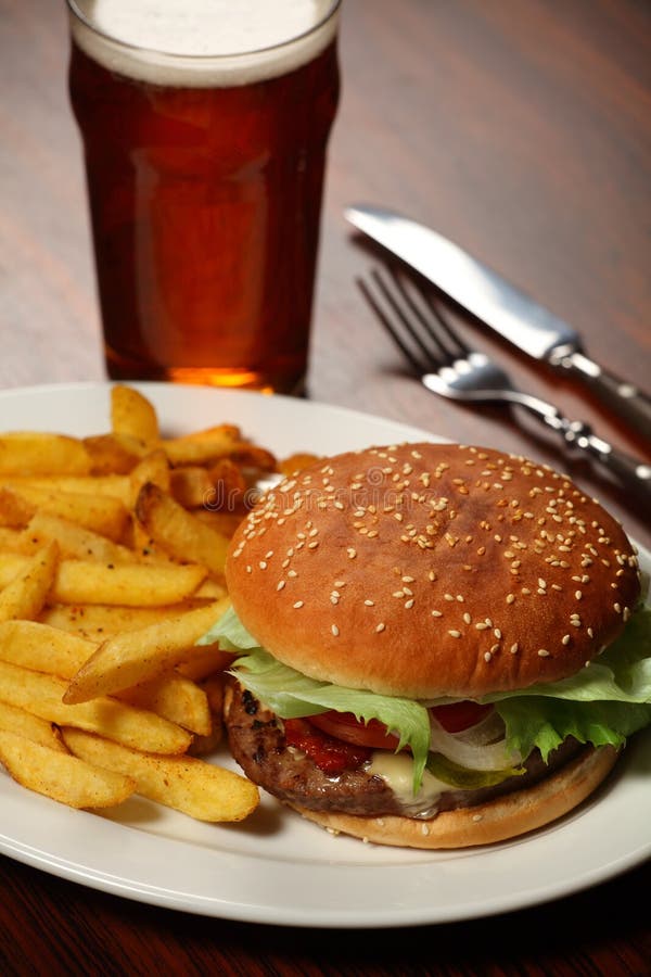 Burger and fries at a Pub royalty free stock photo