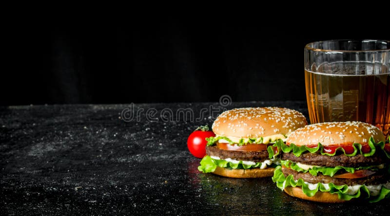 Burgers with beer and tomatoes