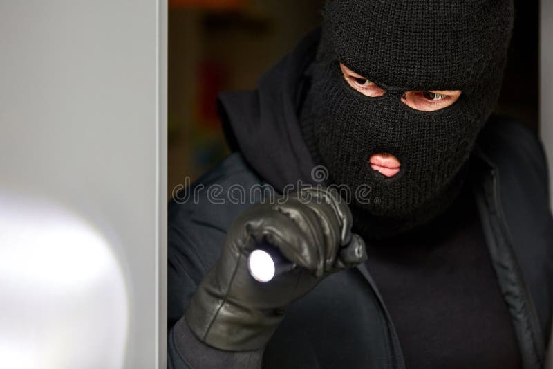 Burglar Breaking in at Night with Flashlight Stock Photo - Image of ...