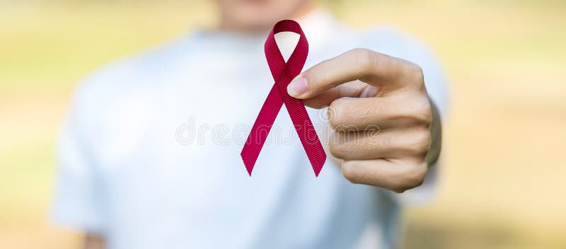 Burgundy Red Ribbon For Supporting People Living And Illness