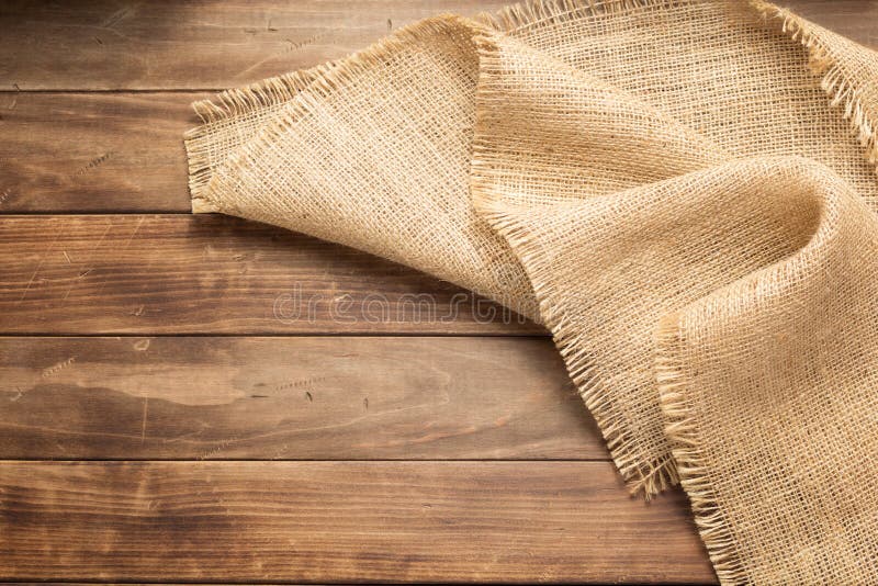 burlap hessian sacking on wooden background stock photography burlap hessian sacking on wooden background stock photography