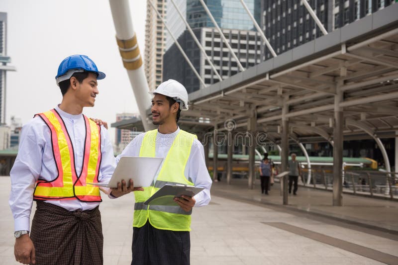 Burmese or Myanmar male engineers in city royalty free stock images Burmese or Myanmar male engineers in city royalty free stock images