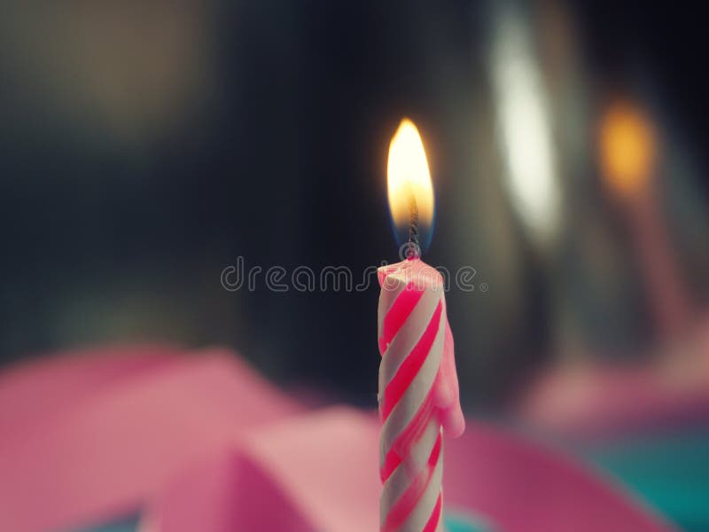 Burning Birthday Candle Cake on a Color Background Stock Photo Image