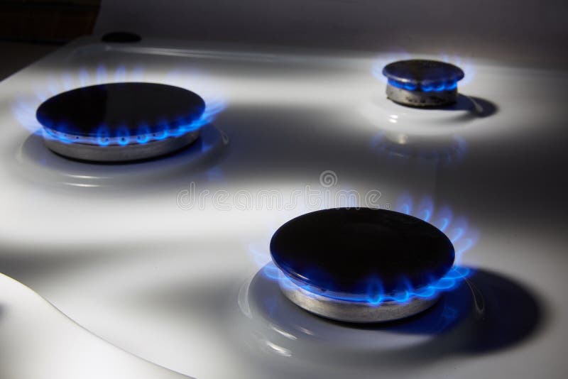 Burning Blue Gas on a White Stove. Focus on the Front Edge of Gas Burners Stock Image Image of