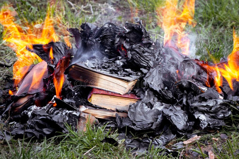 Burning books outdoors, destroying forbidden books, books on the fire