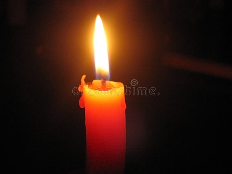 Burning candle stock photo